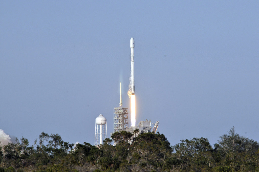 Space Xs Falcon 9 rocket lifts off from space launch complex 39A at Kennedy Space Center, Florida on March 30, 2017, with an SES communications satellite.  
SpaceX blasted off a recycled rocket for the first time on, using a booster that had previously flown cargo to the astronauts living at the International Space Station. / AFP PHOTO / BRUCE WEAVER        (Photo credit should read BRUCE WEAVER/AFP/Getty Images)