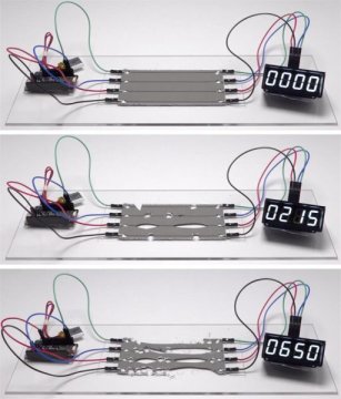 A digital clock continues to run as damaged circuits  heal themselves.