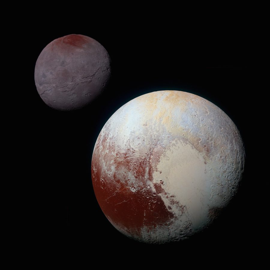 Pluto and Charon by NASAs Marshall Space Flight Center is licensed under CC BY-NC-SA 2.0