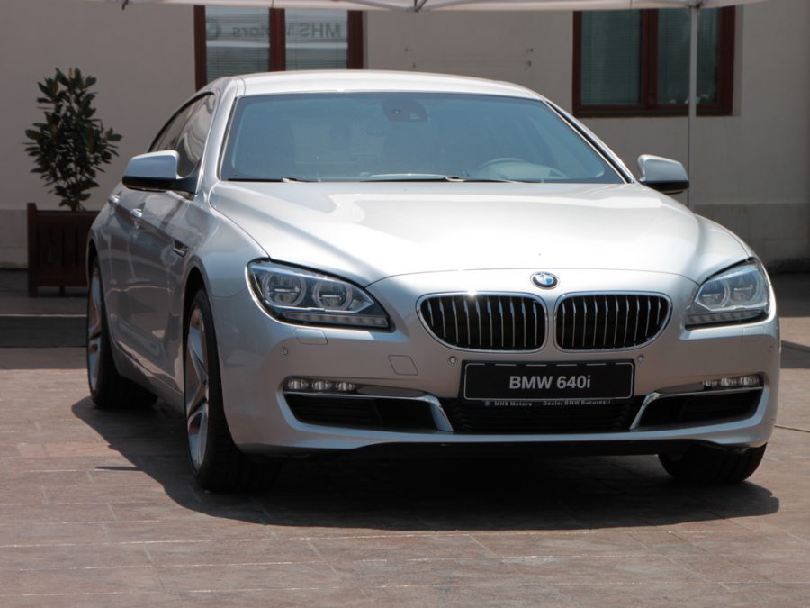"New-BMW-Cars-Models-2012-2013__IMG_7380" by Public Domain Photos is licensed under