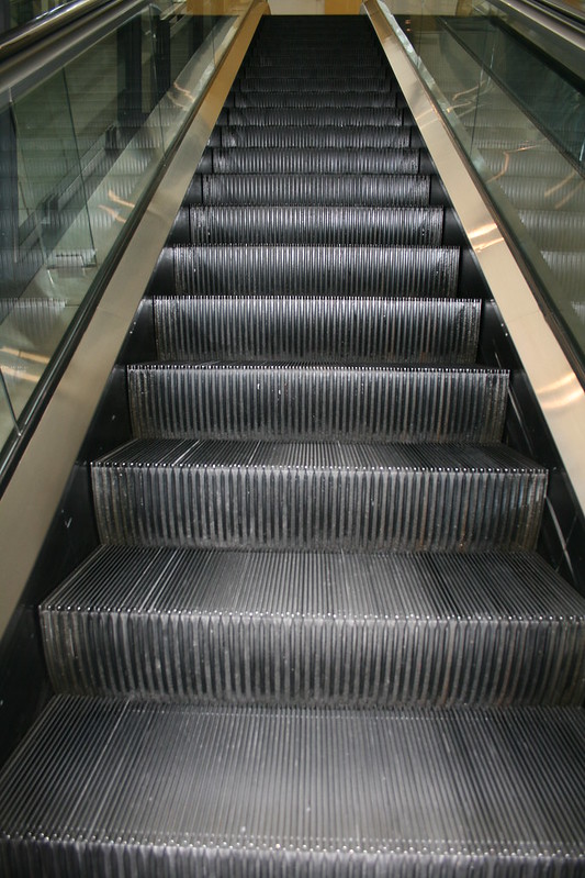 "Escalator" by compujeramey is marked with CC BY 2.0.