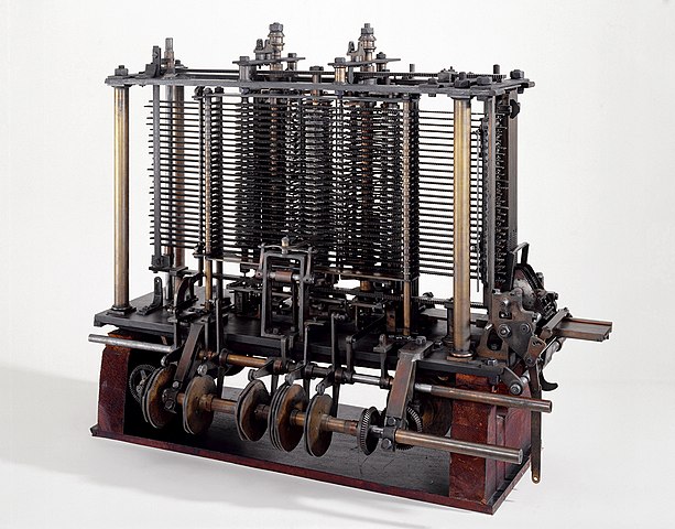 File:Babbages Analytical Engine, 1834-1871. (9660574685).jpg by Science Museum London / Science and Society Picture Library is licensed under CC BY-SA 2.0. To view a copy of this license, visit https://creativecommons.org/licenses/by-sa/2.0/?ref=openverse.