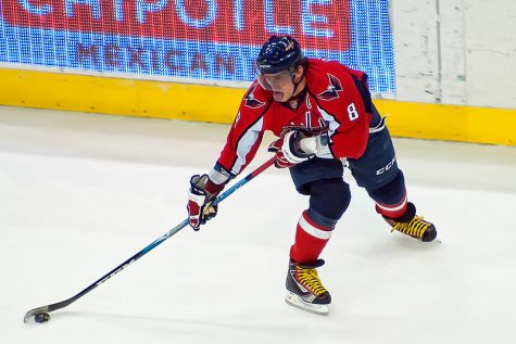 Ovechkin With Puck on Stick and Tongue on Chin by clydeorama is licensed under CC BY-NC 2.0.