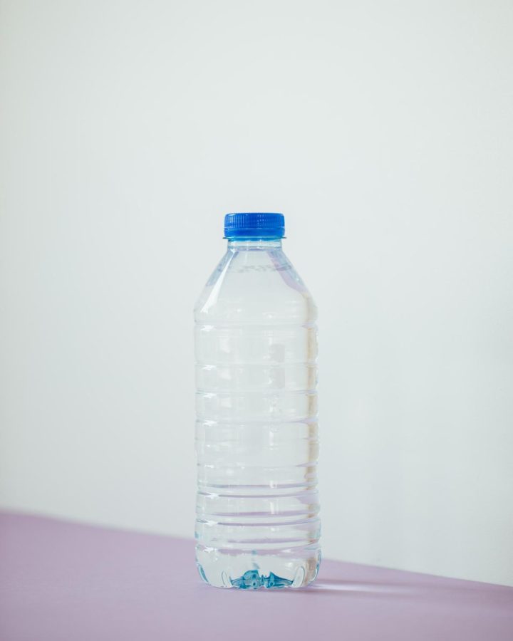The Process Of Throwing Out A Plastic Bottle