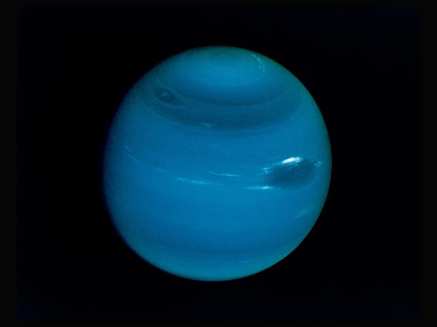 Neptune+on+a+black+background