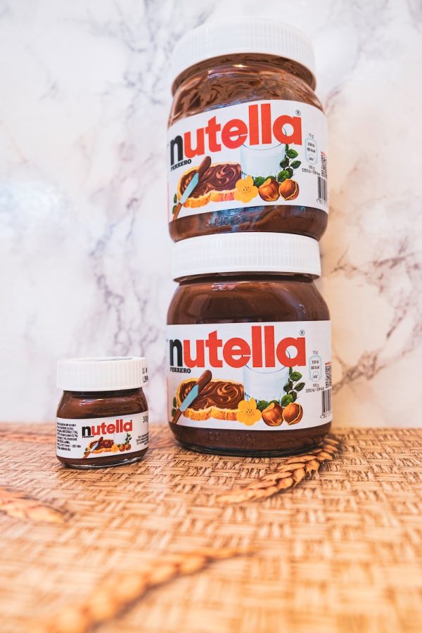 Nutella chocolate spread on brown wooden table
