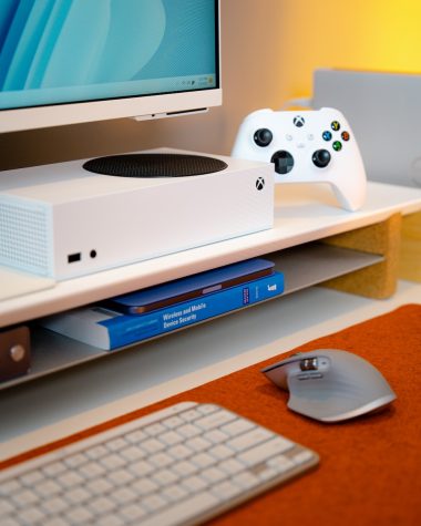 a video game console sitting on top of a desk