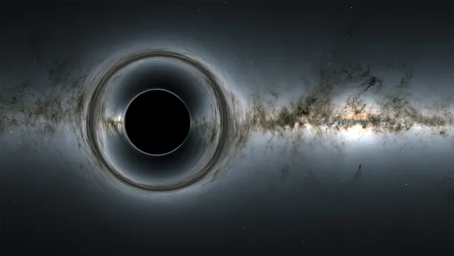 A NASA illustration of a black hole, with the pitch-black heart ringed by the event horizon.