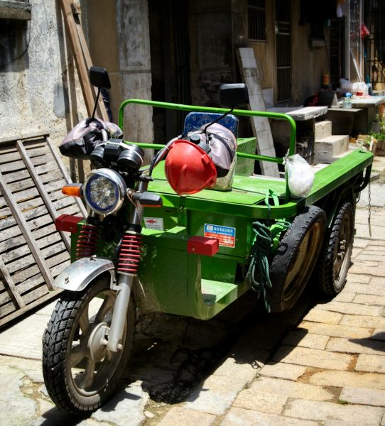 a motorcycle with a side car attached to it