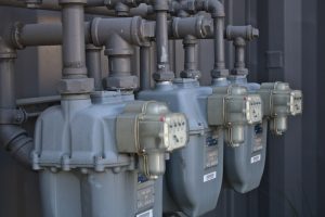 a row of water pumps sitting next to each other