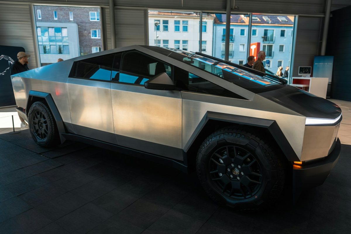 A futuristic car is parked in a garage