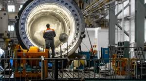 A man working on a nuclear reactor.