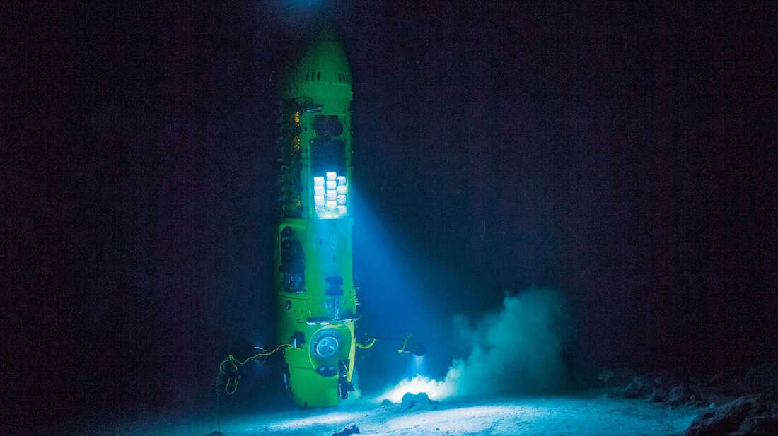 A winch hoists James Cameron's submersible, the Deepsea Challenger, which he helped design.